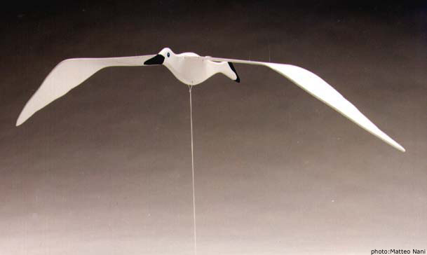 A mobile seagul hanging from ceiling