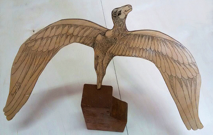 picture of a balancing toy depicting a flying camel